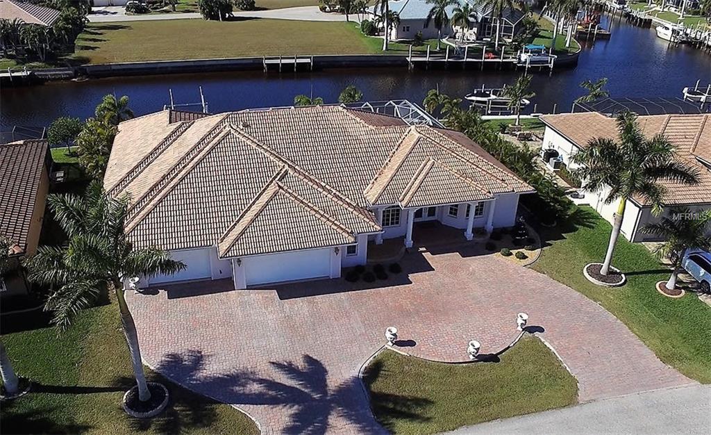 1223 RIDING ROCKS LANE, PUNTA GORDA, Florida 33950, 4 Bedrooms Bedrooms, 10 Rooms Rooms,3 BathroomsBathrooms,Residential,For sale,RIDING ROCKS,C7247376