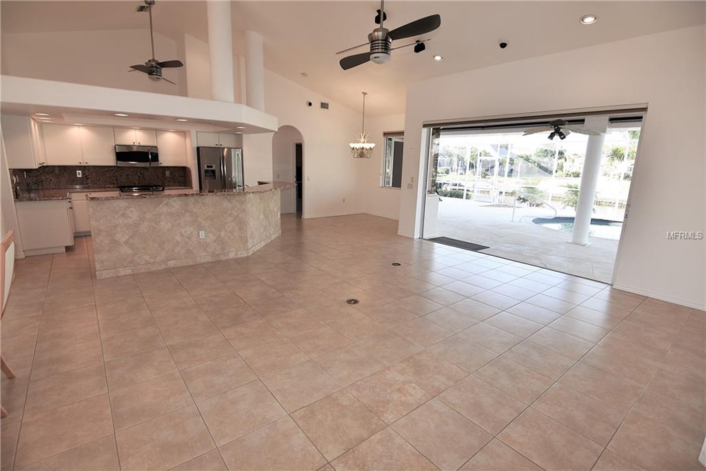 1223 RIDING ROCKS LANE, PUNTA GORDA, Florida 33950, 4 Bedrooms Bedrooms, 10 Rooms Rooms,3 BathroomsBathrooms,Residential,For sale,RIDING ROCKS,C7247376