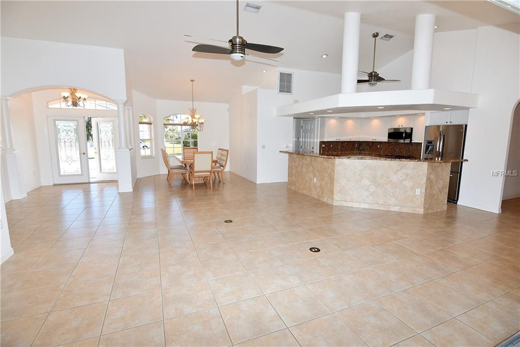 1223 RIDING ROCKS LANE, PUNTA GORDA, Florida 33950, 4 Bedrooms Bedrooms, 10 Rooms Rooms,3 BathroomsBathrooms,Residential,For sale,RIDING ROCKS,C7247376