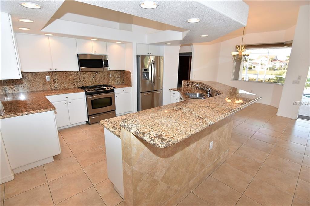 1223 RIDING ROCKS LANE, PUNTA GORDA, Florida 33950, 4 Bedrooms Bedrooms, 10 Rooms Rooms,3 BathroomsBathrooms,Residential,For sale,RIDING ROCKS,C7247376