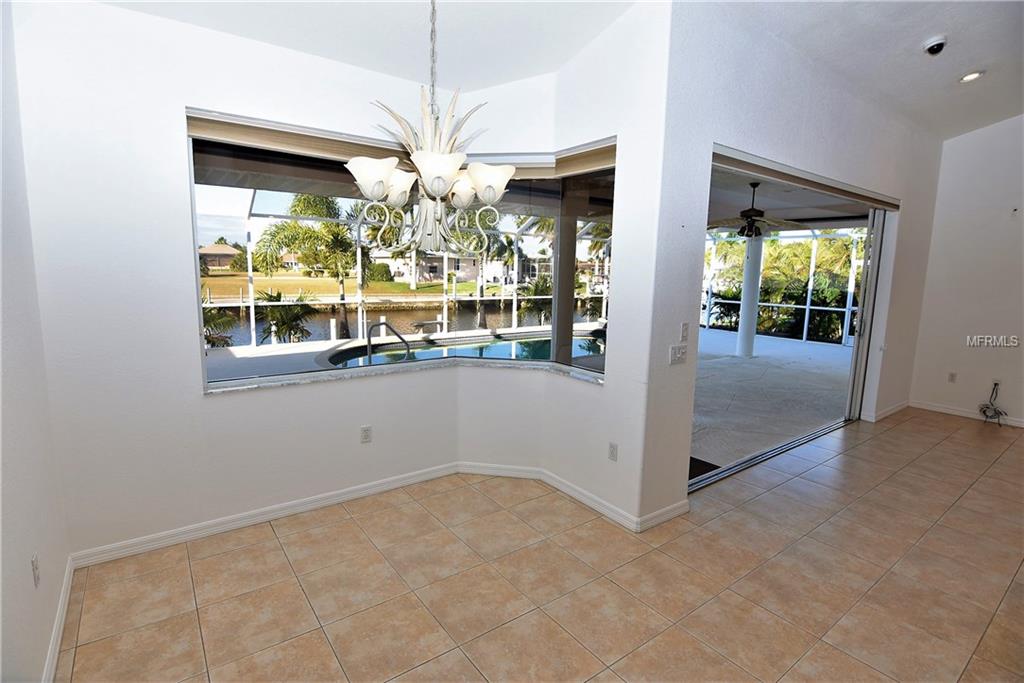 1223 RIDING ROCKS LANE, PUNTA GORDA, Florida 33950, 4 Bedrooms Bedrooms, 10 Rooms Rooms,3 BathroomsBathrooms,Residential,For sale,RIDING ROCKS,C7247376