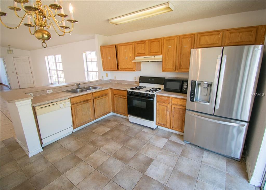 130 RICHMAR AVENUE, HAINES CITY, Florida 33844, 4 Bedrooms Bedrooms, 3 Rooms Rooms,2 BathroomsBathrooms,Residential,For sale,RICHMAR,P4719046