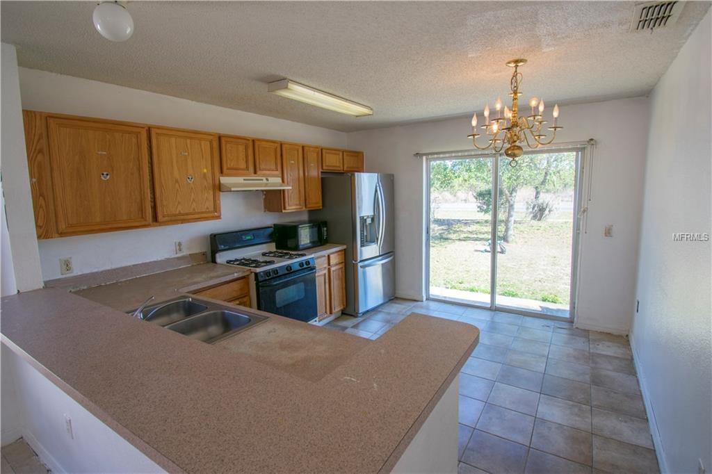 130 RICHMAR AVENUE, HAINES CITY, Florida 33844, 4 Bedrooms Bedrooms, 3 Rooms Rooms,2 BathroomsBathrooms,Residential,For sale,RICHMAR,P4719046