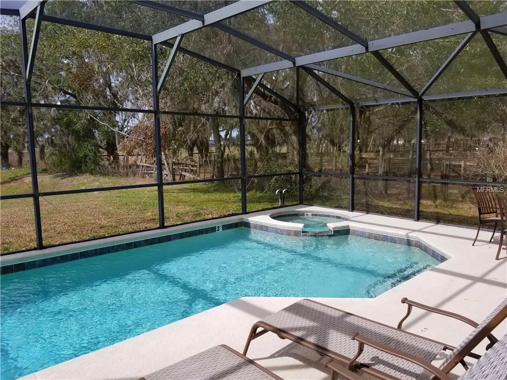 1386 ANDALUSIA LOOP, DAVENPORT, Florida 33837, 5 Bedrooms Bedrooms, 7 Rooms Rooms,4 BathroomsBathrooms,Residential,For sale,ANDALUSIA,S4851088