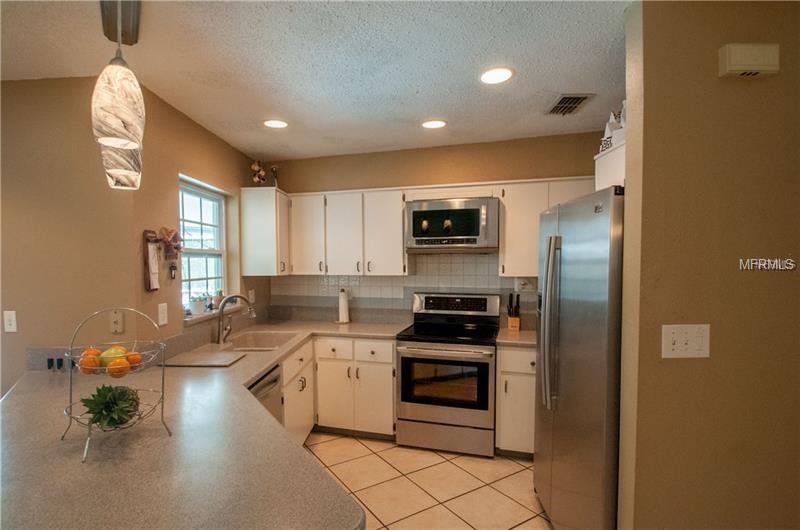 1140 WEXFORD LEAS BOULEVARD, PALM HARBOR, Florida 34683, 4 Bedrooms Bedrooms, 4 Rooms Rooms,2 BathroomsBathrooms,Residential,For sale,WEXFORD LEAS,U7847063