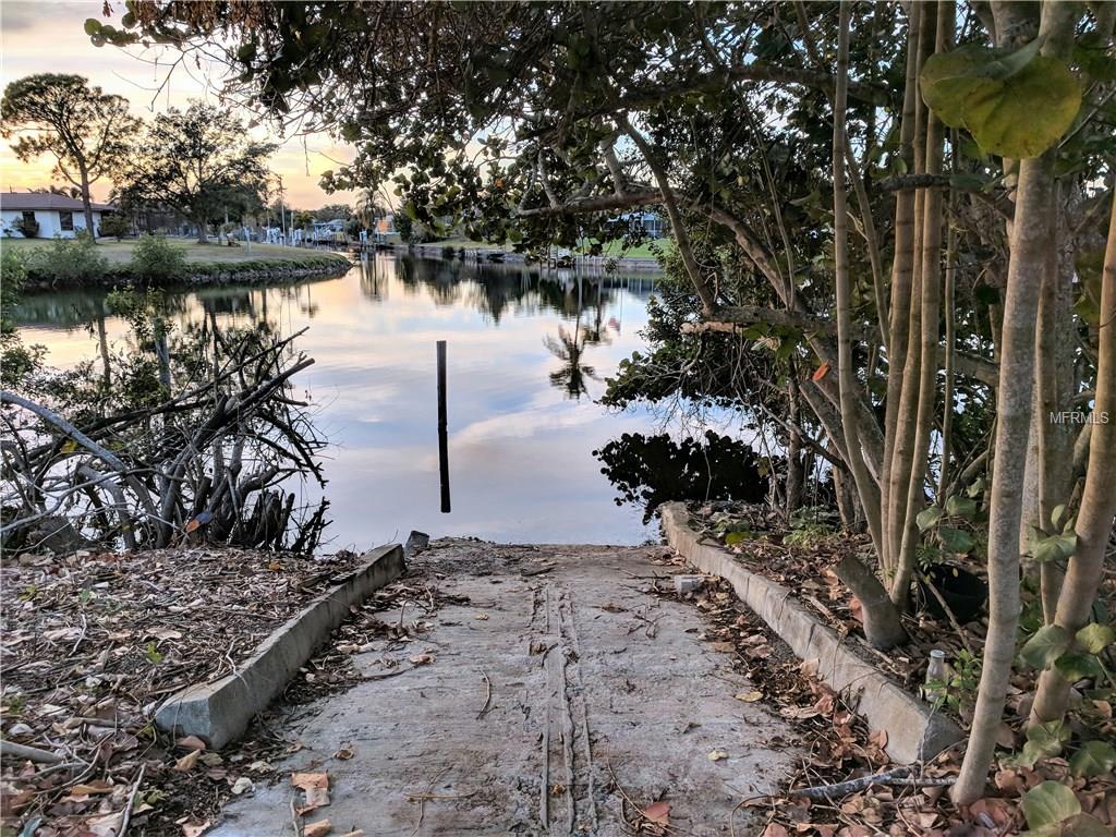 113 DUNN DRIVE NE, PORT CHARLOTTE, Florida 33952, 3 Bedrooms Bedrooms, 8 Rooms Rooms,2 BathroomsBathrooms,Residential,For sale,DUNN,C7248935