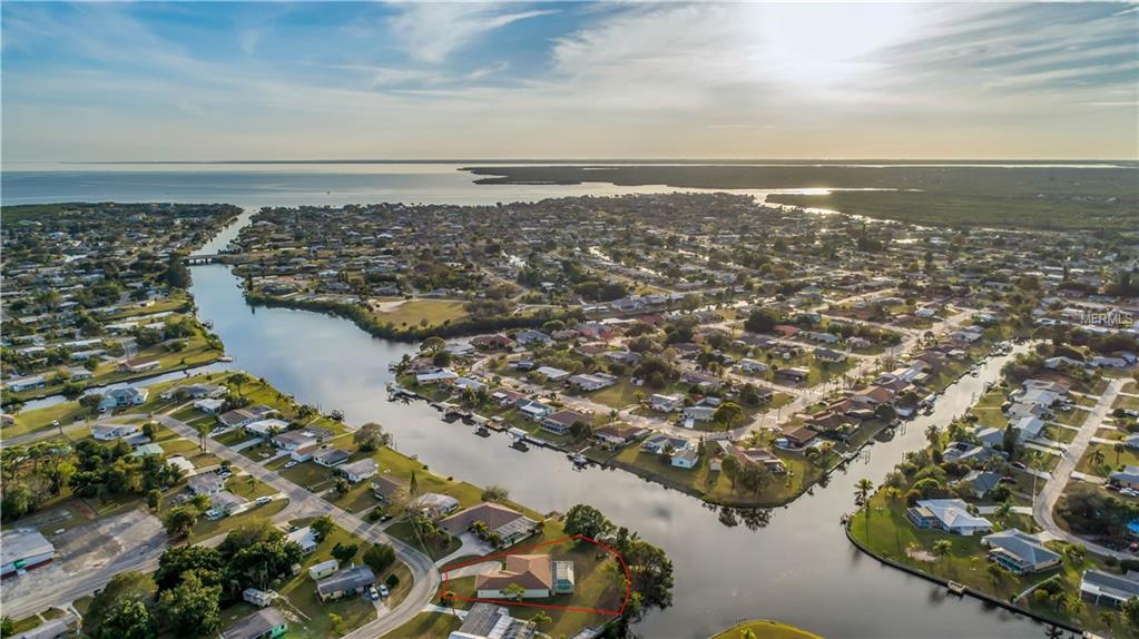 113 DUNN DRIVE NE, PORT CHARLOTTE, Florida 33952, 3 Bedrooms Bedrooms, 8 Rooms Rooms,2 BathroomsBathrooms,Residential,For sale,DUNN,C7248935