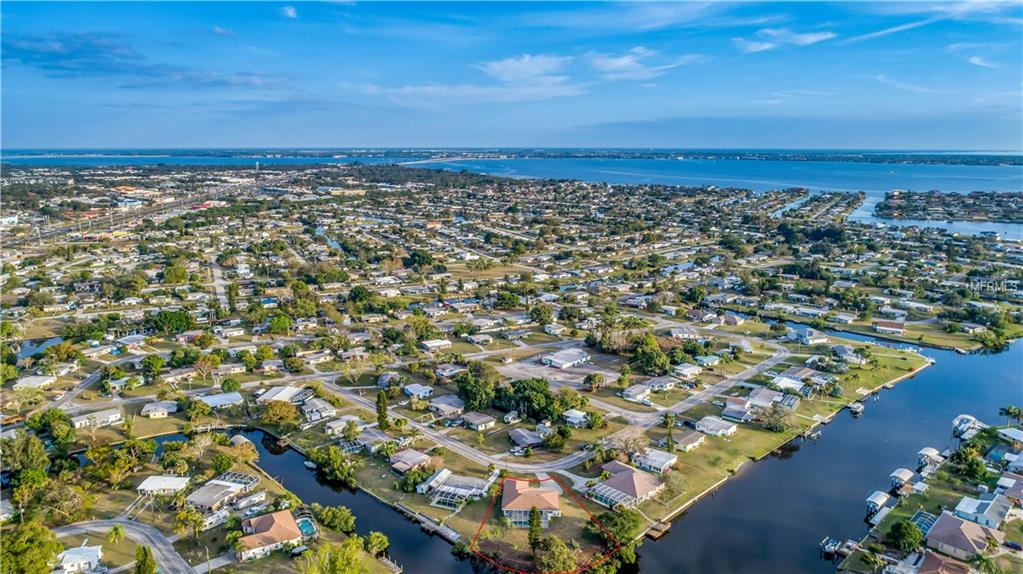 113 DUNN DRIVE NE, PORT CHARLOTTE, Florida 33952, 3 Bedrooms Bedrooms, 8 Rooms Rooms,2 BathroomsBathrooms,Residential,For sale,DUNN,C7248935