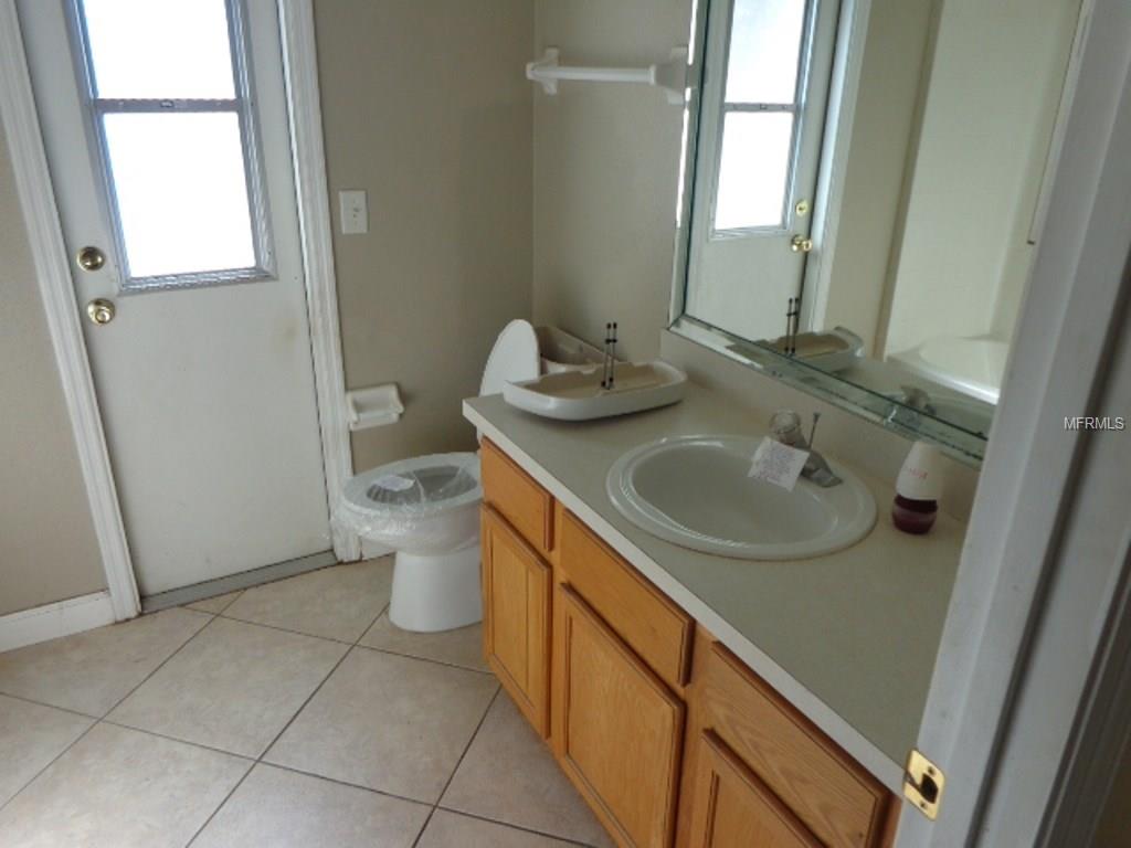 302 COUNTRY LAKES CIRCLE, GROVELAND, Florida 34736, 3 Bedrooms Bedrooms, 6 Rooms Rooms,2 BathroomsBathrooms,Residential,For sale,COUNTRY LAKES,G4852727