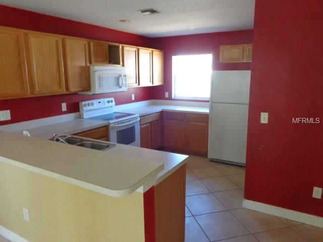 302 COUNTRY LAKES CIRCLE, GROVELAND, Florida 34736, 3 Bedrooms Bedrooms, 6 Rooms Rooms,2 BathroomsBathrooms,Residential,For sale,COUNTRY LAKES,G4852727