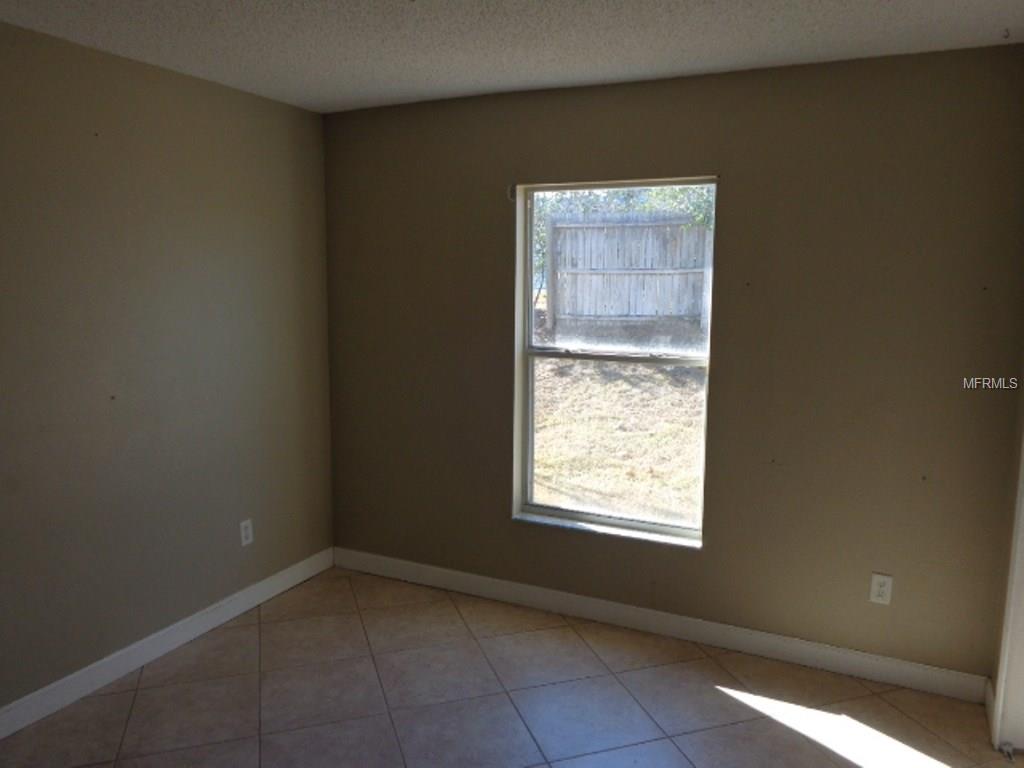 302 COUNTRY LAKES CIRCLE, GROVELAND, Florida 34736, 3 Bedrooms Bedrooms, 6 Rooms Rooms,2 BathroomsBathrooms,Residential,For sale,COUNTRY LAKES,G4852727