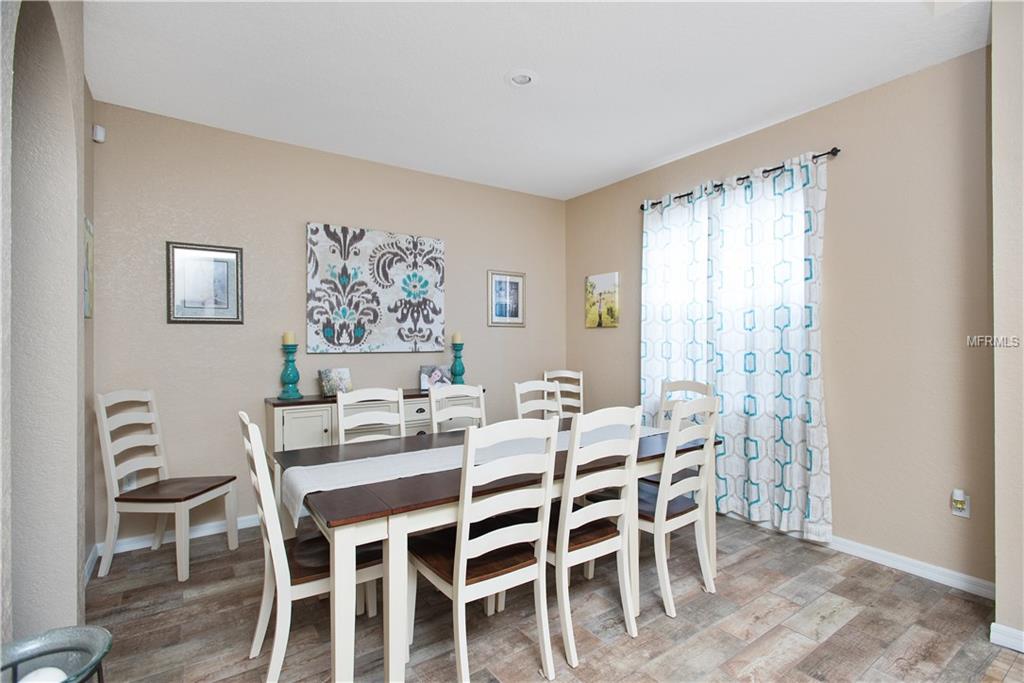 8230 WOODVINE CIRCLE, LAKELAND, Florida 33810, 4 Bedrooms Bedrooms, 8 Rooms Rooms,2 BathroomsBathrooms,Residential,For sale,WOODVINE,T2921352