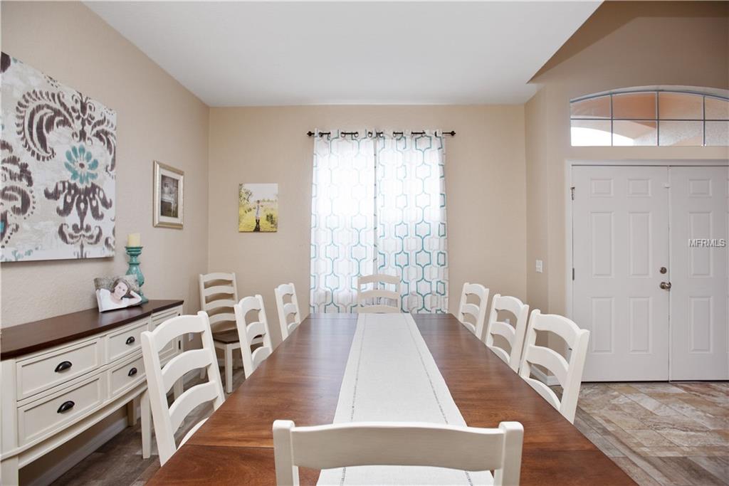 8230 WOODVINE CIRCLE, LAKELAND, Florida 33810, 4 Bedrooms Bedrooms, 8 Rooms Rooms,2 BathroomsBathrooms,Residential,For sale,WOODVINE,T2921352