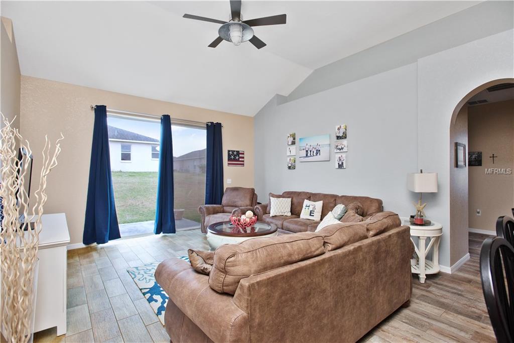 8230 WOODVINE CIRCLE, LAKELAND, Florida 33810, 4 Bedrooms Bedrooms, 8 Rooms Rooms,2 BathroomsBathrooms,Residential,For sale,WOODVINE,T2921352