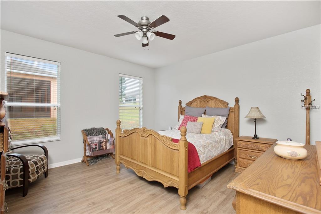 8230 WOODVINE CIRCLE, LAKELAND, Florida 33810, 4 Bedrooms Bedrooms, 8 Rooms Rooms,2 BathroomsBathrooms,Residential,For sale,WOODVINE,T2921352