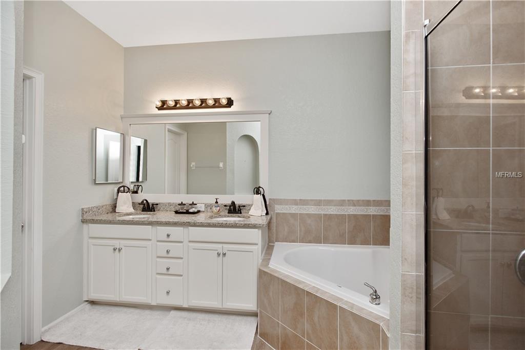 8230 WOODVINE CIRCLE, LAKELAND, Florida 33810, 4 Bedrooms Bedrooms, 8 Rooms Rooms,2 BathroomsBathrooms,Residential,For sale,WOODVINE,T2921352