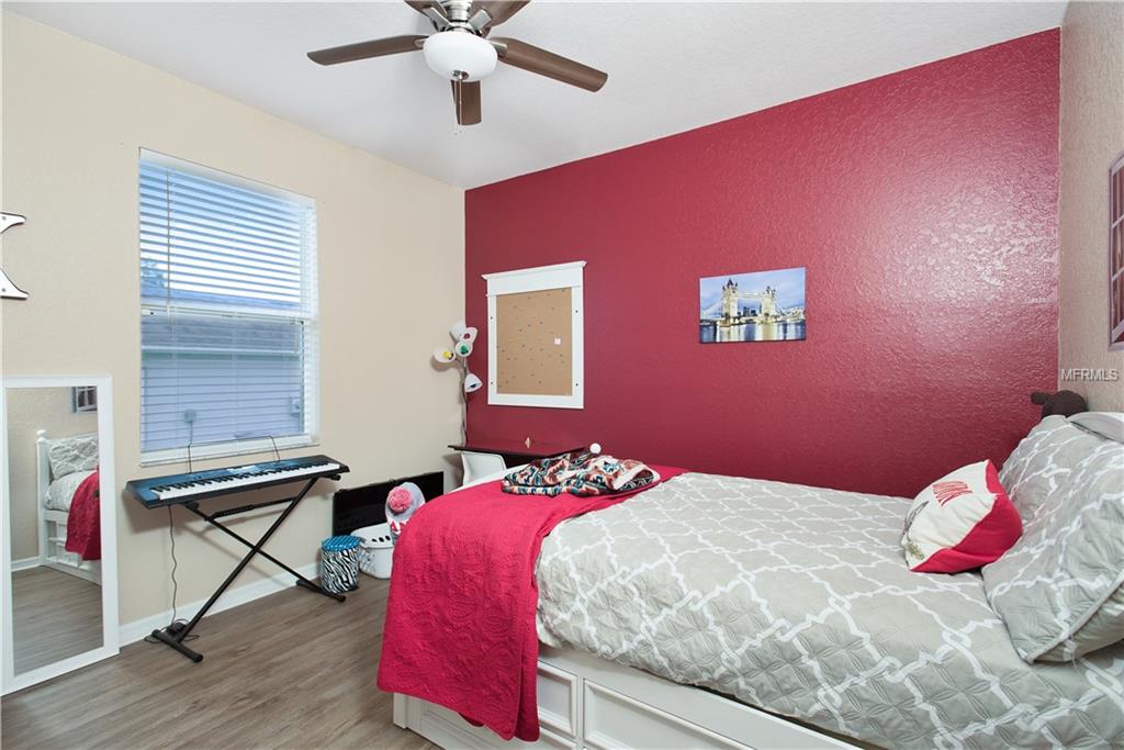 8230 WOODVINE CIRCLE, LAKELAND, Florida 33810, 4 Bedrooms Bedrooms, 8 Rooms Rooms,2 BathroomsBathrooms,Residential,For sale,WOODVINE,T2921352