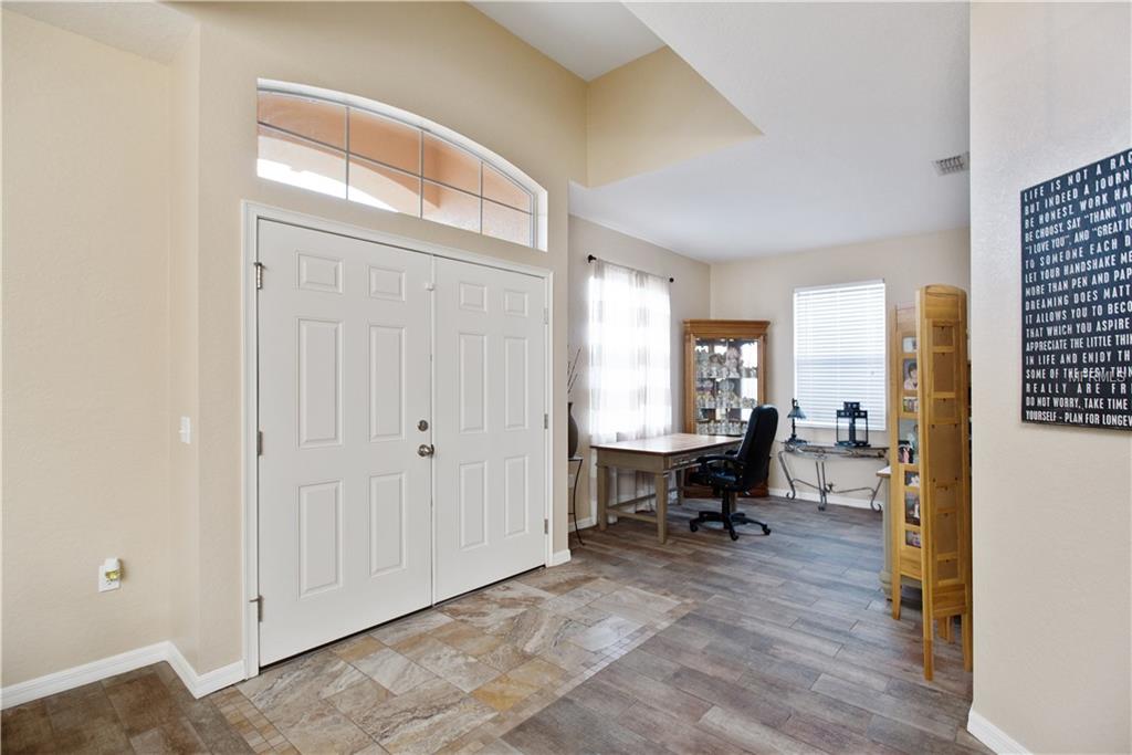 8230 WOODVINE CIRCLE, LAKELAND, Florida 33810, 4 Bedrooms Bedrooms, 8 Rooms Rooms,2 BathroomsBathrooms,Residential,For sale,WOODVINE,T2921352