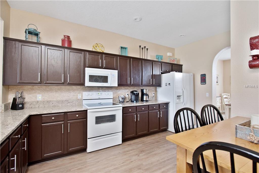 8230 WOODVINE CIRCLE, LAKELAND, Florida 33810, 4 Bedrooms Bedrooms, 8 Rooms Rooms,2 BathroomsBathrooms,Residential,For sale,WOODVINE,T2921352