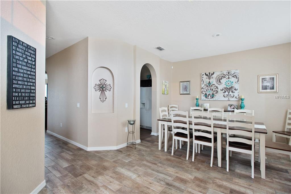 8230 WOODVINE CIRCLE, LAKELAND, Florida 33810, 4 Bedrooms Bedrooms, 8 Rooms Rooms,2 BathroomsBathrooms,Residential,For sale,WOODVINE,T2921352