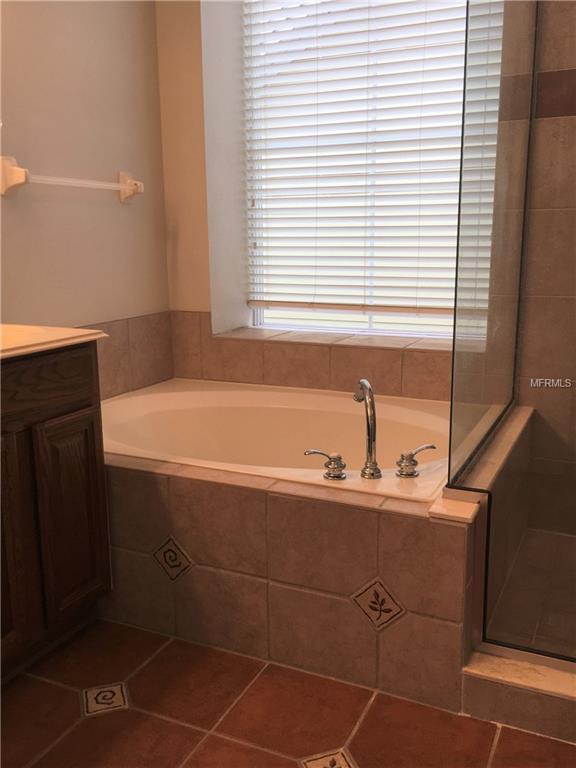 913 PONDVIEW COURT, CELEBRATION, Florida 34747, 4 Bedrooms Bedrooms, 8 Rooms Rooms,2 BathroomsBathrooms,Residential,For sale,PONDVIEW,O5546742