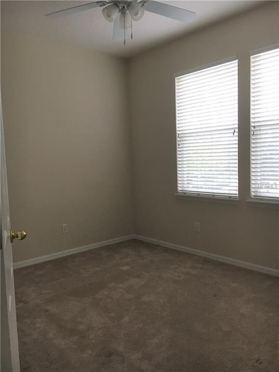 913 PONDVIEW COURT, CELEBRATION, Florida 34747, 4 Bedrooms Bedrooms, 8 Rooms Rooms,2 BathroomsBathrooms,Residential,For sale,PONDVIEW,O5546742