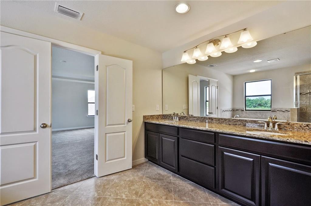 144 WHIRLAWAY DRIVE, DAVENPORT, Florida 33837, 5 Bedrooms Bedrooms, 10 Rooms Rooms,4 BathroomsBathrooms,Residential,For sale,WHIRLAWAY,W7631882