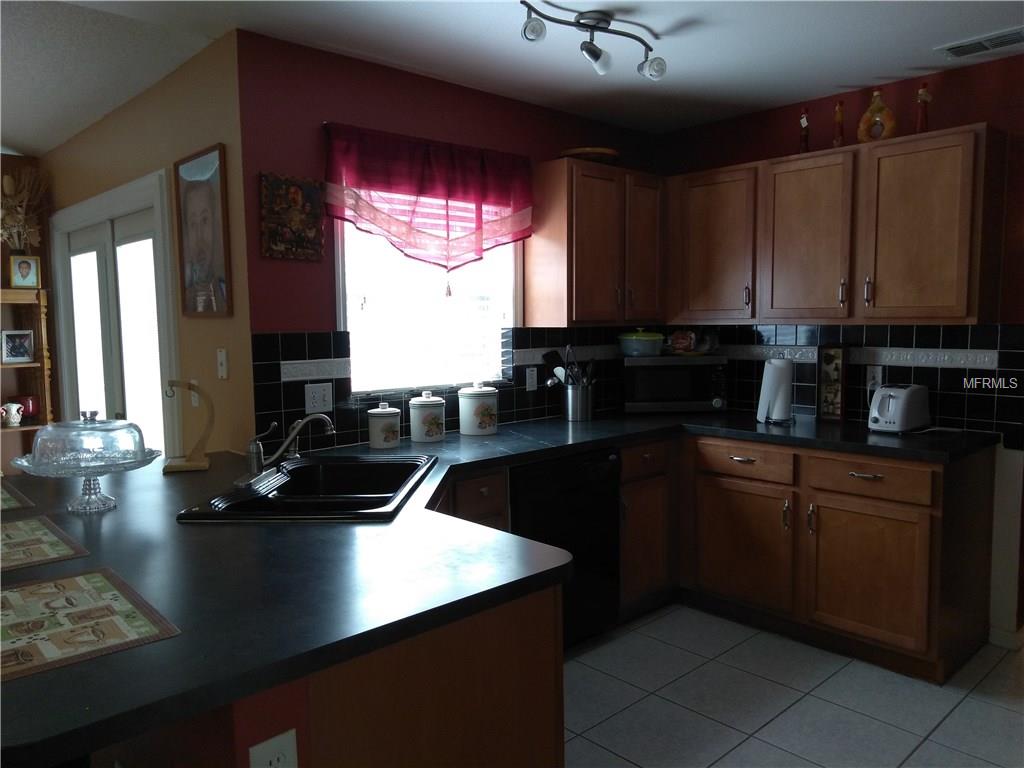 668 MILAN DRIVE, KISSIMMEE, Florida 34758, 3 Bedrooms Bedrooms, 7 Rooms Rooms,2 BathroomsBathrooms,Residential,For sale,MILAN,O5561900