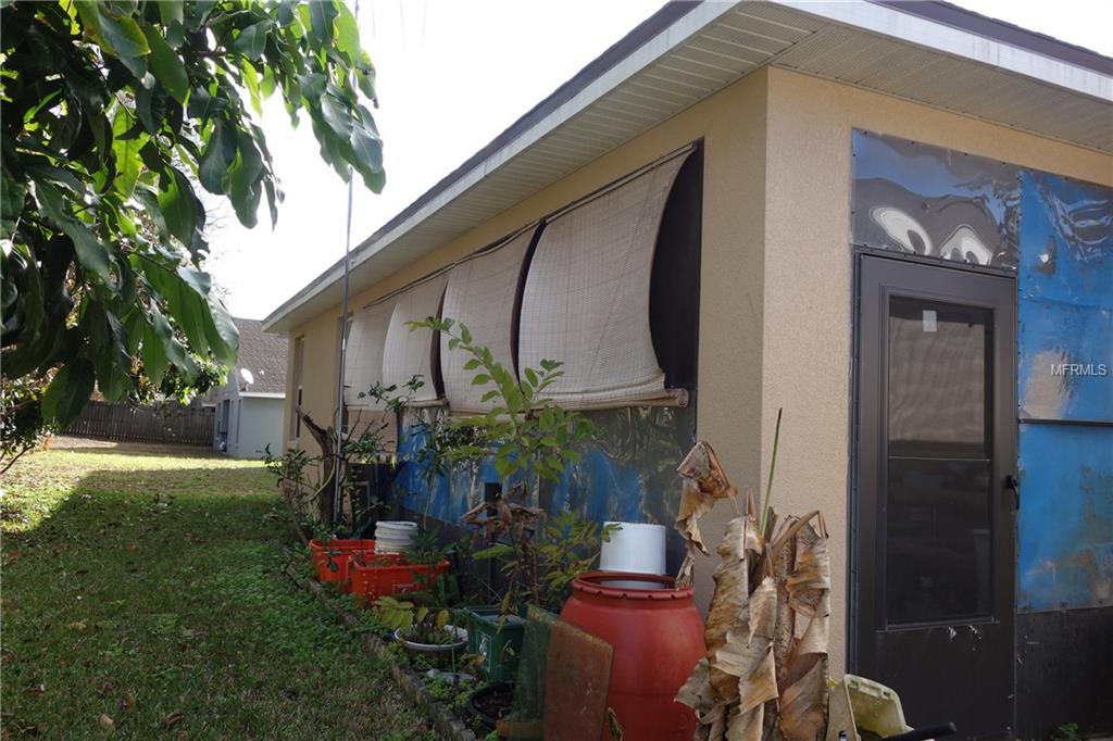 5593 BERWOOD DRIVE, ORLANDO, Florida 32810, 4 Bedrooms Bedrooms, 8 Rooms Rooms,3 BathroomsBathrooms,Residential,For sale,BERWOOD,O5559841