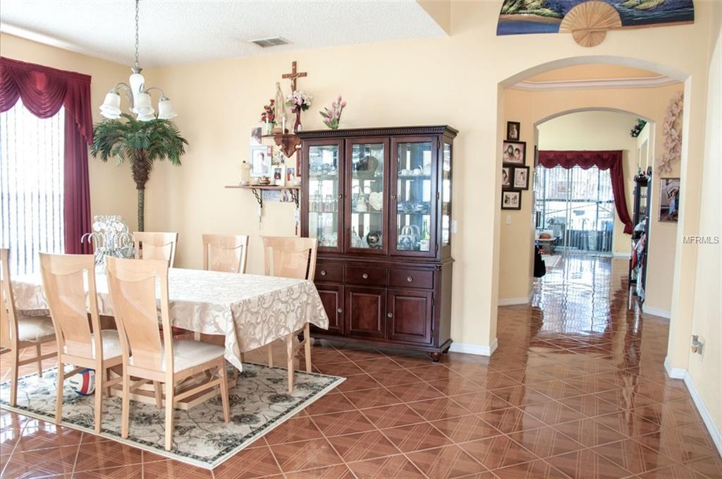 5593 BERWOOD DRIVE, ORLANDO, Florida 32810, 4 Bedrooms Bedrooms, 8 Rooms Rooms,3 BathroomsBathrooms,Residential,For sale,BERWOOD,O5559841