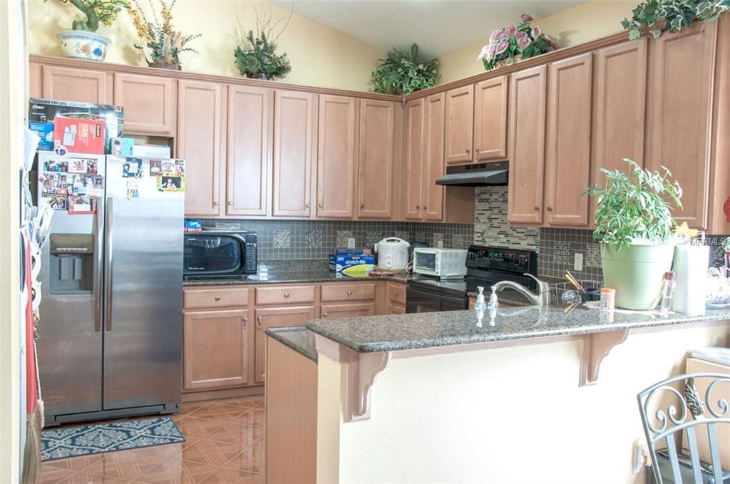 5593 BERWOOD DRIVE, ORLANDO, Florida 32810, 4 Bedrooms Bedrooms, 8 Rooms Rooms,3 BathroomsBathrooms,Residential,For sale,BERWOOD,O5559841