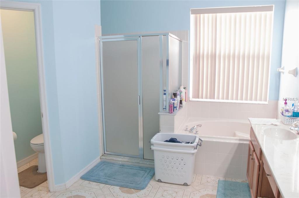 5593 BERWOOD DRIVE, ORLANDO, Florida 32810, 4 Bedrooms Bedrooms, 8 Rooms Rooms,3 BathroomsBathrooms,Residential,For sale,BERWOOD,O5559841