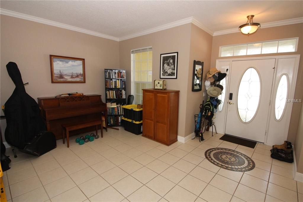 2654 TOPSAIL HILL STREET, ORLANDO, Florida 32828, 4 Bedrooms Bedrooms, 9 Rooms Rooms,2 BathroomsBathrooms,Residential,For sale,TOPSAIL HILL,O5561533