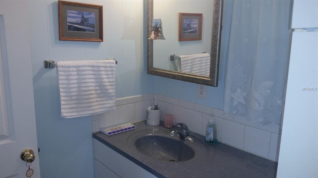 1942 BLUE LAKE DRIVE, LAKELAND, Florida 33801, 3 Bedrooms Bedrooms, 7 Rooms Rooms,2 BathroomsBathrooms,Residential,For sale,BLUE LAKE,L4724917