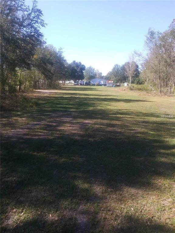 4238 COYOTE TRAIL, POLK CITY, Florida 33868, 3 Bedrooms Bedrooms, 5 Rooms Rooms,2 BathroomsBathrooms,Residential,For sale,COYOTE,P4717746