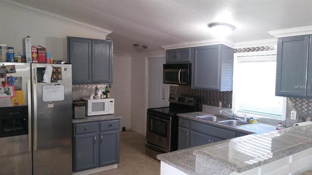 4238 COYOTE TRAIL, POLK CITY, Florida 33868, 3 Bedrooms Bedrooms, 5 Rooms Rooms,2 BathroomsBathrooms,Residential,For sale,COYOTE,P4717746