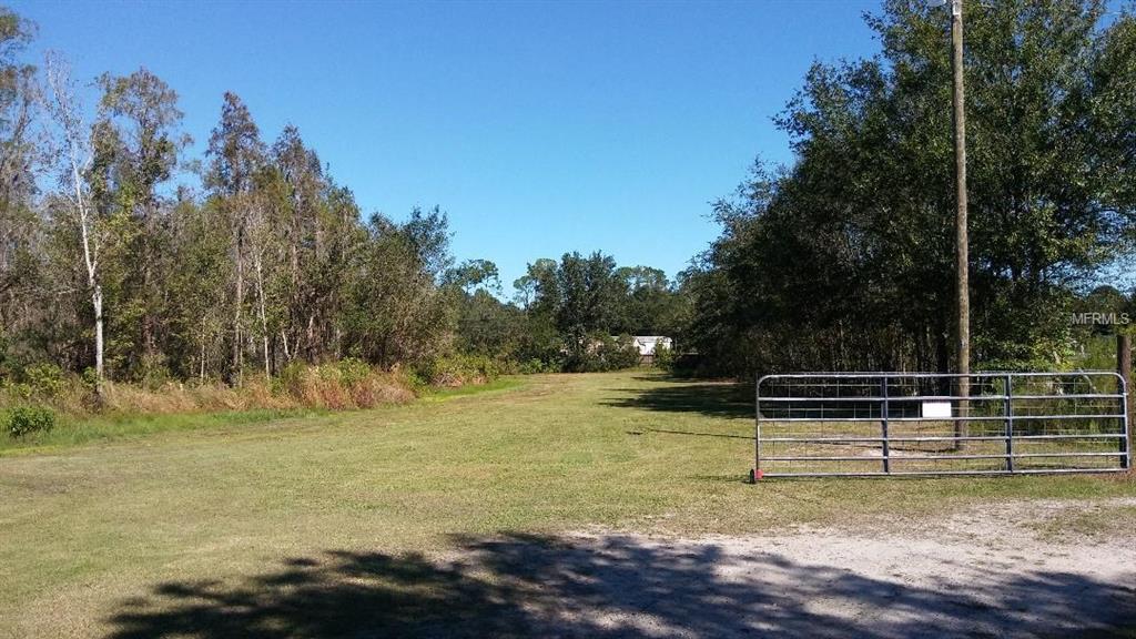 4238 COYOTE TRAIL, POLK CITY, Florida 33868, 3 Bedrooms Bedrooms, 5 Rooms Rooms,2 BathroomsBathrooms,Residential,For sale,COYOTE,P4717746