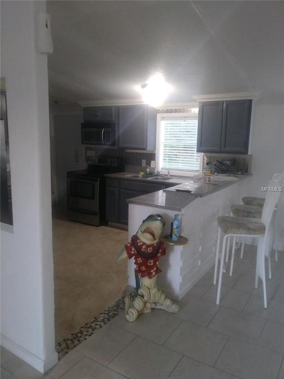 4238 COYOTE TRAIL, POLK CITY, Florida 33868, 3 Bedrooms Bedrooms, 5 Rooms Rooms,2 BathroomsBathrooms,Residential,For sale,COYOTE,P4717746