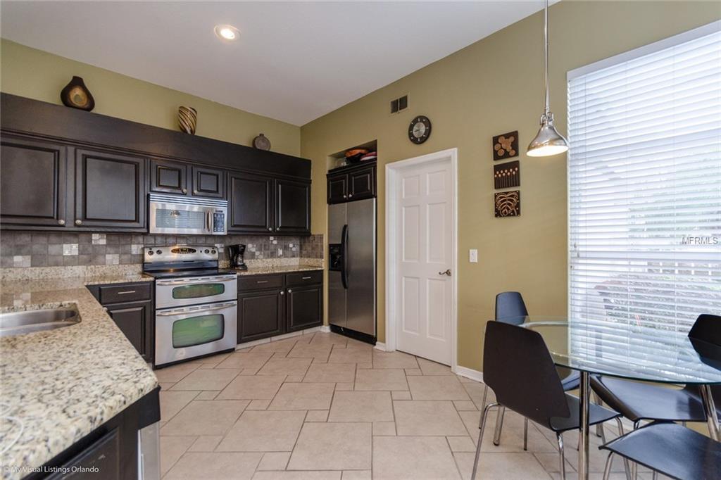 7244 HAWKSNEST BOULEVARD, ORLANDO, Florida 32835, 3 Bedrooms Bedrooms, 6 Rooms Rooms,2 BathroomsBathrooms,Residential,For sale,HAWKSNEST,O5555636