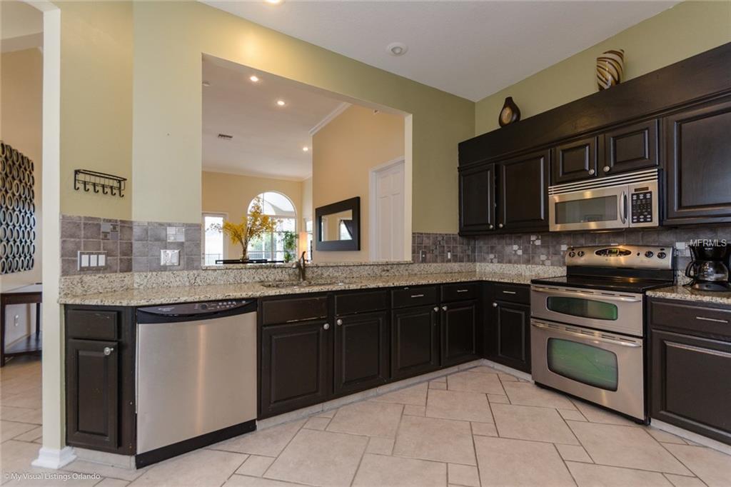 7244 HAWKSNEST BOULEVARD, ORLANDO, Florida 32835, 3 Bedrooms Bedrooms, 6 Rooms Rooms,2 BathroomsBathrooms,Residential,For sale,HAWKSNEST,O5555636