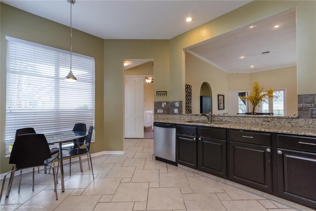 7244 HAWKSNEST BOULEVARD, ORLANDO, Florida 32835, 3 Bedrooms Bedrooms, 6 Rooms Rooms,2 BathroomsBathrooms,Residential,For sale,HAWKSNEST,O5555636