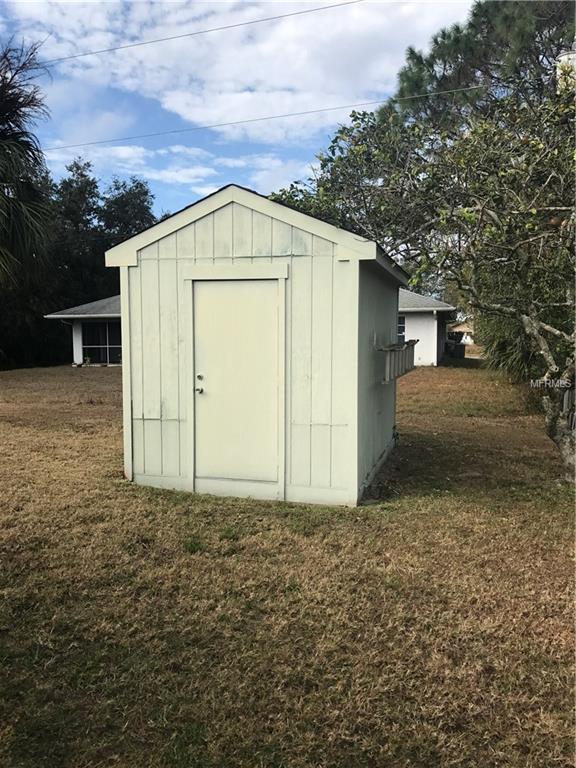 1033 BOUNDS STREET, PORT CHARLOTTE, Florida 33952, 3 Bedrooms Bedrooms, 7 Rooms Rooms,2 BathroomsBathrooms,Residential,For sale,BOUNDS,C7248523