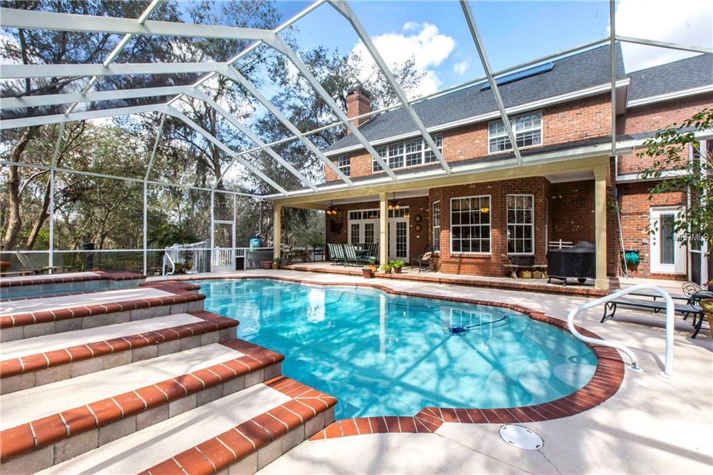 7375 MILLBROOK OAKS DR, LAKELAND, Florida 33813, 5 Bedrooms Bedrooms, 11 Rooms Rooms,4 BathroomsBathrooms,Residential,For sale,MILLBROOK OAKS DR,L4725478