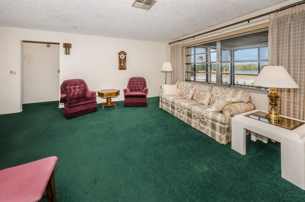 3140 JACKSON DRIVE, HOLIDAY, Florida 34691, 3 Bedrooms Bedrooms, 5 Rooms Rooms,2 BathroomsBathrooms,Residential,For sale,JACKSON,W7637414