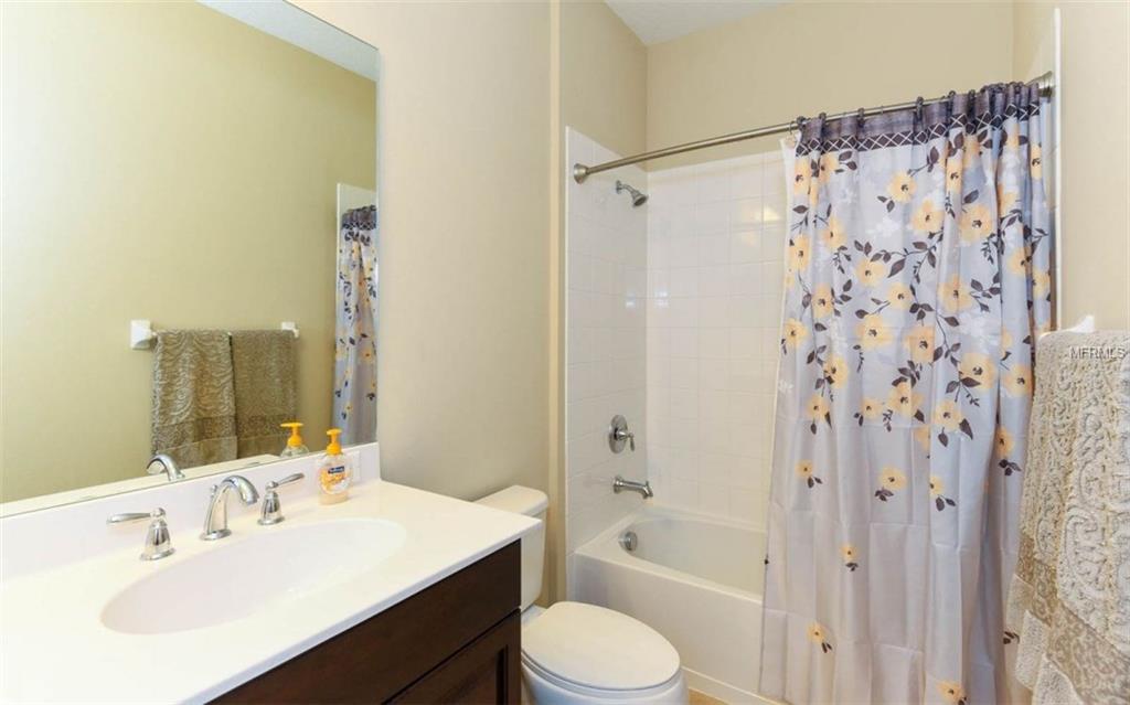 11106 BLUE MAGNOLIA LANE, PARRISH, Florida 34219, 4 Bedrooms Bedrooms, 11 Rooms Rooms,2 BathroomsBathrooms,Residential,For sale,BLUE MAGNOLIA,A4195774