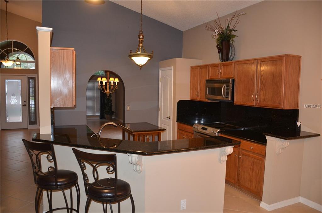 881 WHITE IVEY COURT, APOPKA, Florida 32712, 3 Bedrooms Bedrooms, 9 Rooms Rooms,2 BathroomsBathrooms,Residential,For sale,WHITE IVEY,O5561779