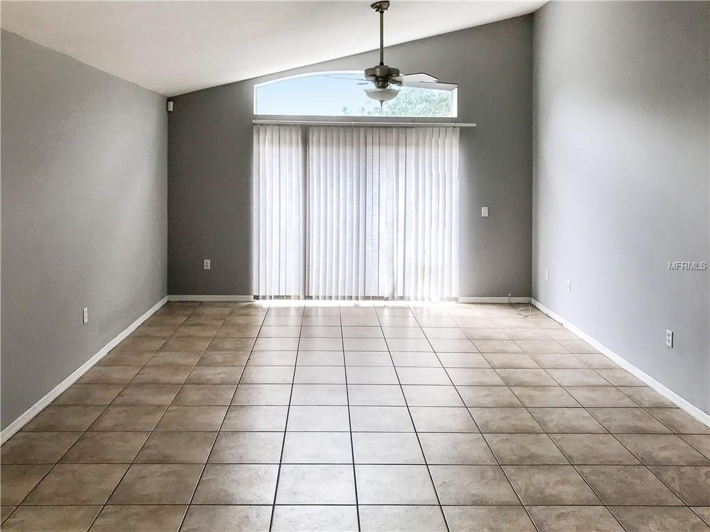 5729 LAKE CHAMPLAIN DRIVE, ORLANDO, Florida 32829, 4 Bedrooms Bedrooms, 8 Rooms Rooms,2 BathroomsBathrooms,Residential,For sale,LAKE CHAMPLAIN,S4857054