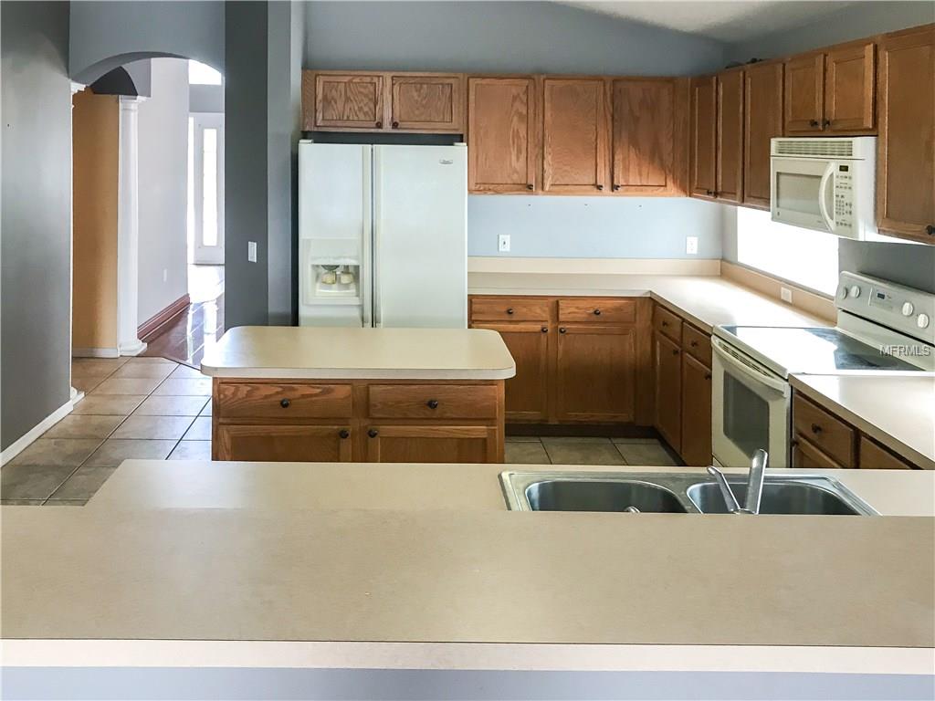 5729 LAKE CHAMPLAIN DRIVE, ORLANDO, Florida 32829, 4 Bedrooms Bedrooms, 8 Rooms Rooms,2 BathroomsBathrooms,Residential,For sale,LAKE CHAMPLAIN,S4857054