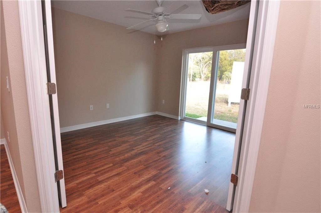 6781 BASSWOOD CIRCLE, ZEPHYRHILLS, Florida 33542, 3 Bedrooms Bedrooms, 6 Rooms Rooms,2 BathroomsBathrooms,Residential,For sale,BASSWOOD,E2204947