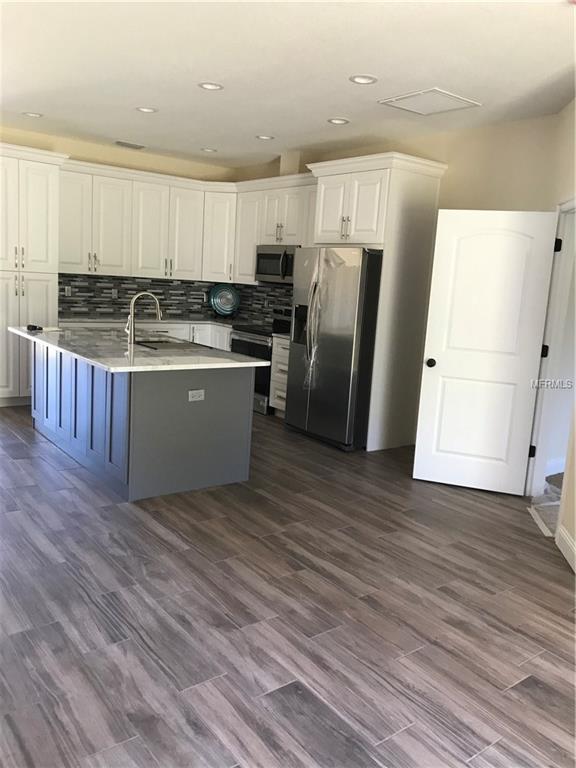 19112 SUNLAKE BOULEVARD, LUTZ, Florida 33558, 4 Bedrooms Bedrooms, 8 Rooms Rooms,3 BathroomsBathrooms,Residential,For sale,SUNLAKE,T2913796